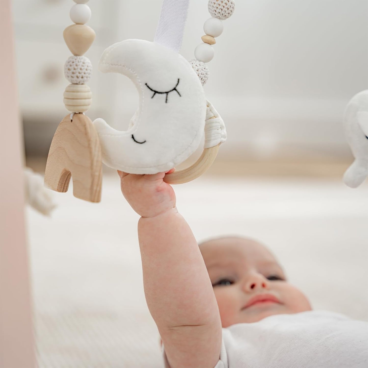 Comfy Cubs Wooden Baby Play Gym - Natural Finish Pinewood Baby Activity Gym with 5 Sensory Hanging Toys - Easy No-Tool Assembly, Safe and Durable for Infant Motor and Visual Development - Blush