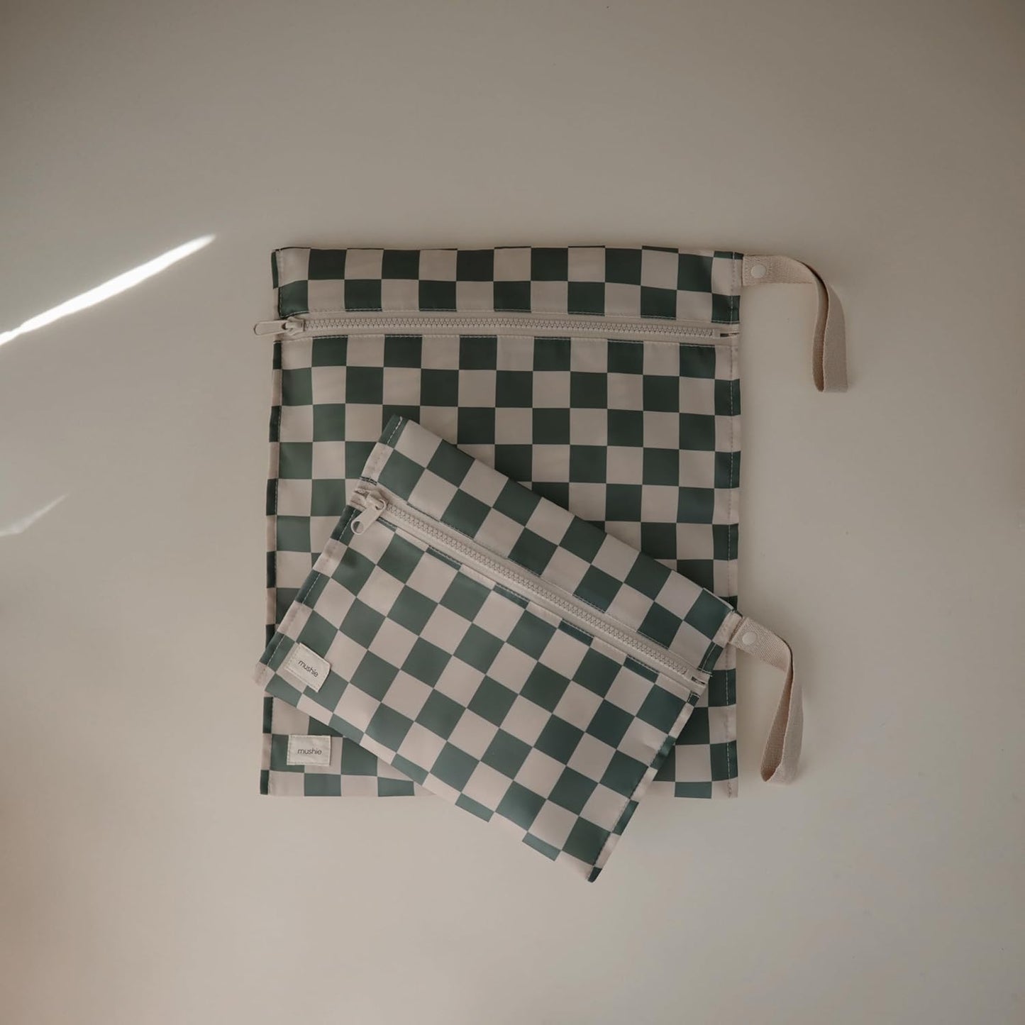 mushie Water Resistant Wet Bags | Large & Small Reusable Storage Bag for Baby Items and Travel | Zippered Pockets with Handle | Machine Washable, Set of 2 (Olive Check)