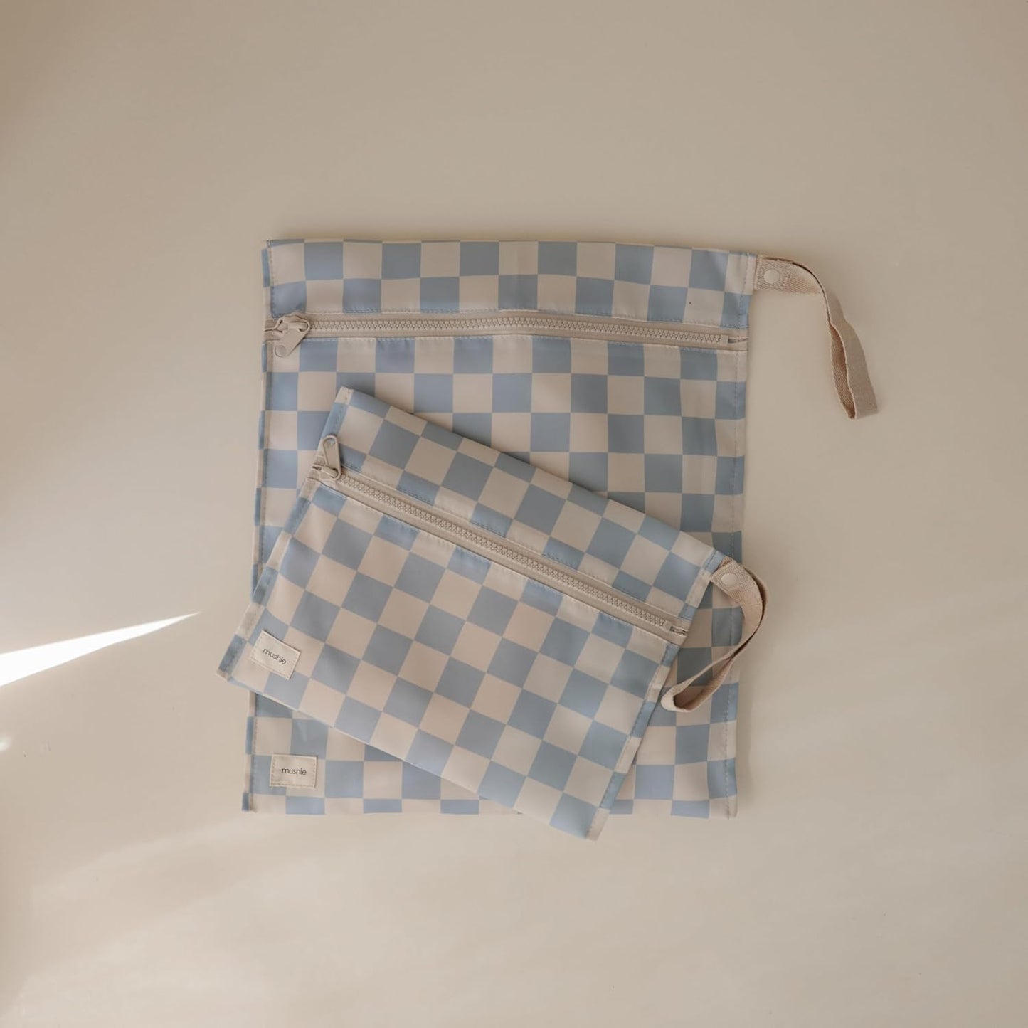 mushie Water Resistant Wet Bags | Large & Small Reusable Storage Bag for Baby Items and Travel | Zippered Pockets with Handle | Machine Washable, Set of 2 (Blue Check)