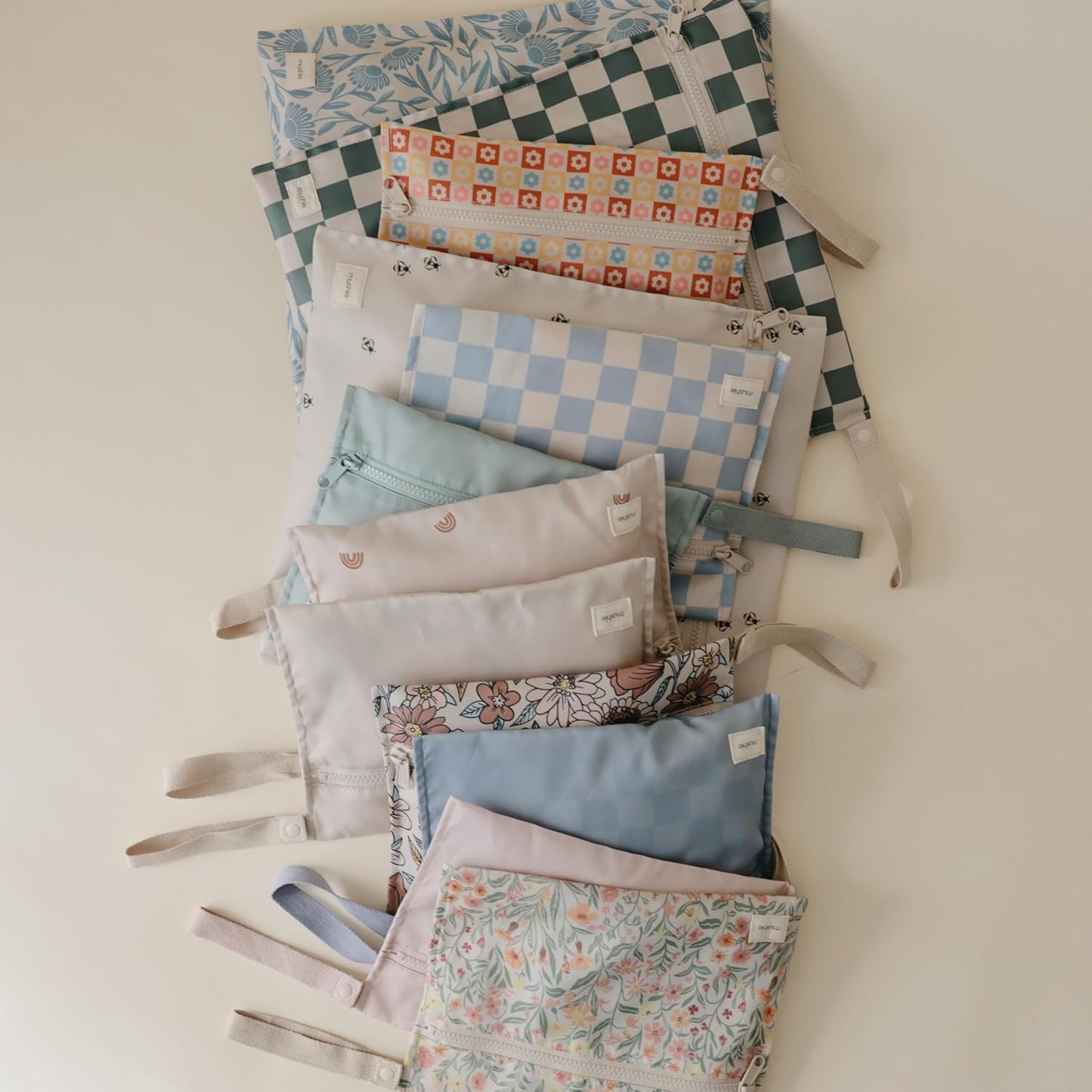 mushie Water Resistant Wet Bags | Large & Small Reusable Storage Bag for Baby Items and Travel | Zippered Pockets with Handle | Machine Washable, Set of 2 (Happy Flowers Check)